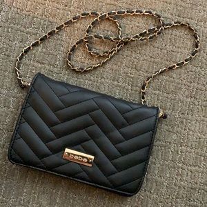 Bebe black & gold purse